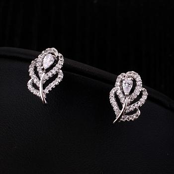 Leaf design fashion earing with crystal ...